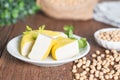 Yellow tofu sliced on plate with soy bean.