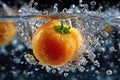 Yellow Tomato Splashing into Water with Bubbles Royalty Free Stock Photo