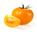 Yellow tomatoe with slices and water drops