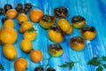 Yellow tomatoes Beauty King on an old wooden table Royalty Free Stock Photo