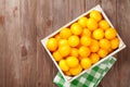 Yellow tomatoes box Royalty Free Stock Photo