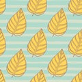 Yellow tones leaves ornament seamlesss pattern. Doodle elements on blue stripped background