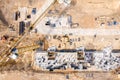 Yellow tower crane working at construction site. aerial top view Royalty Free Stock Photo