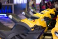 Yellow toy bikes in playground in a line for racing simulation Royalty Free Stock Photo