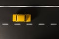 Yellow toy car on a black background. Royalty Free Stock Photo