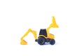 The yellow toy car Bulldozer-Excavator isolated on white background. Children`s backhoe toy model