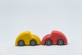 Yellow toy car crashed red toy car accident with white background Royalty Free Stock Photo