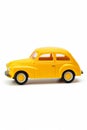 Yellow toy car on white background with white background. Generative AI Royalty Free Stock Photo