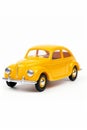 Yellow toy car on white background with white background. Generative AI Royalty Free Stock Photo