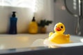 A yellow toy duck bathes in a bubble bath Royalty Free Stock Photo