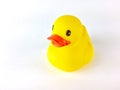 Yellow toy duck isolated on white background