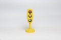 Yellow Toy Traffic light isolated on white background Royalty Free Stock Photo