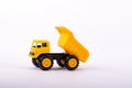 Yellow toy truck isolated on white Royalty Free Stock Photo