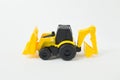 Yellow Tractor Loader Toy on white background isolation image.