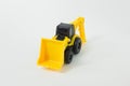 Yellow Tractor Loader Toy on white background isolation image.