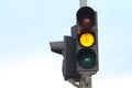 Yellow traffic light isolated Royalty Free Stock Photo