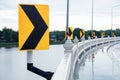 Yellow traffic signs to show curves in rainy day.Signal turn right on country road Royalty Free Stock Photo