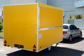 Yellow trailer-shop