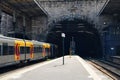 Yellow train leaving the station. Royalty Free Stock Photo