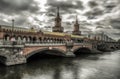 Yellow train on Oberbaum bridge, over river Spree in city Berlin at Germany Royalty Free Stock Photo