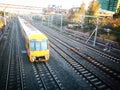 Yellow Train running on track in fast speed motion image. Royalty Free Stock Photo