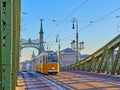 The yellow tram on Liberty Bridge, Budapest, Hungary