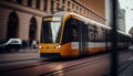 Yellow tram with motion blur effect moves fast in the city. High speed passenger train in motion on railroad Royalty Free Stock Photo