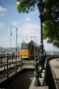 Yellow tram near Chain bridge in Budapest Royalty Free Stock Photo