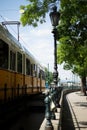 Yellow tram near Chain bridge in Budapest Royalty Free Stock Photo