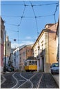 Yellow tram number 28 on the streets of Lisbon, Portugal