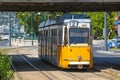 Yellow tram under Elisabeth Bridge in Budapest Royalty Free Stock Photo