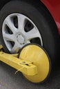 Yellow Triangle Wheel Clamp Locked With Messing Lock