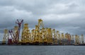 Tripods for supporting wind turbines awaiting relocation in the North Sea, photographed at port in Cromarty, Scotland UK. Royalty Free Stock Photo