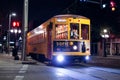 Yellow trolley driving in Ybor city at night right outside downtown Tampa, Florida - USA - May 23, 2018