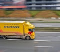 Yellow truck on the highway. Lille, France.