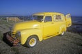 A yellow truck on the Pacific Coast Highway, California Royalty Free Stock Photo