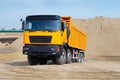 Yellow truck in the sand quarry