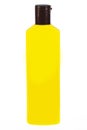 Yellow tube bottle of shampoo, conditioner, hair rinse, gel, on a white background with reflection Royalty Free Stock Photo