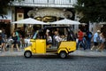 Yellow tuk-tuk tourist taxi in Lisbon, Portugal