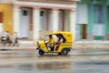 HAVANA, CUBA - OCTOBER 21, 2017: Yellow Tuk Tuk Vehicle in Havana, Cuba Royalty Free Stock Photo