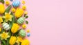 Yellow tulips and daffodils with colorful Easter eggs and chicks on pink background Royalty Free Stock Photo