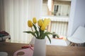 Yellow tulips flower bouquet decoration item on an indoor scene