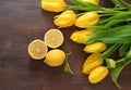 yellow tulips and green apples, lemon on white background. Royalty Free Stock Photo