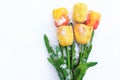 Yellow tulips in the snow. Festive background. Mother`s, International Women`s Day, Birthday, 8 March, Saint Valentine Royalty Free Stock Photo