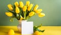 Yellow tulips in a vase on the yellow surface background with copy space. Spring floral beautiful easter card. Fresh flowers. Royalty Free Stock Photo