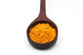 Yellow turmeric in wooden spoon,Ground turmeric on wooden spoon