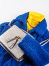 Yellow turtle neck with gray handbag, blue coat Royalty Free Stock Photo