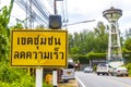 Yellow typical Asian street road sign Thailand