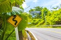 Yellow typical Asian street road sign Thailand