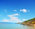 Yellow umbrella by the shore in Alghero Royalty Free Stock Photo